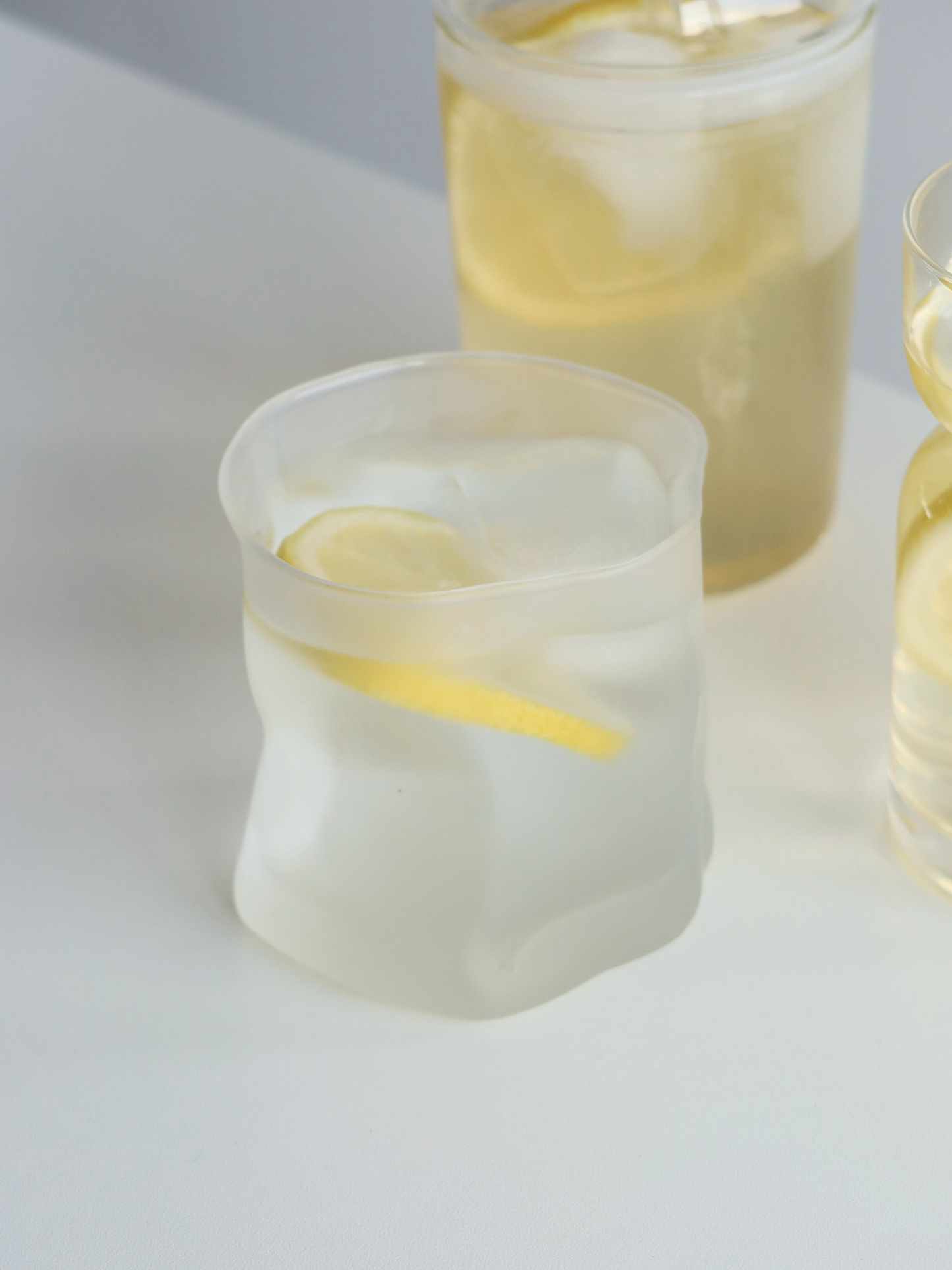 Matte glass, textured surface, rocky design, trendy drinkware, modern aesthetics, muted tones, natural materials, handcrafted look, organic texture, stylish glassware, minimalist style, rustic elegance, contemporary home decor, tactile finish, earthy vibe, sophisticated design, unique glass cup, cozy ambiance, refined simplicity, artistic craftsmanship, glass Ikea, glass Temu, glass Hema, affordable glassware, popular glass brands, budget-friendly glass, everyday glass cup.