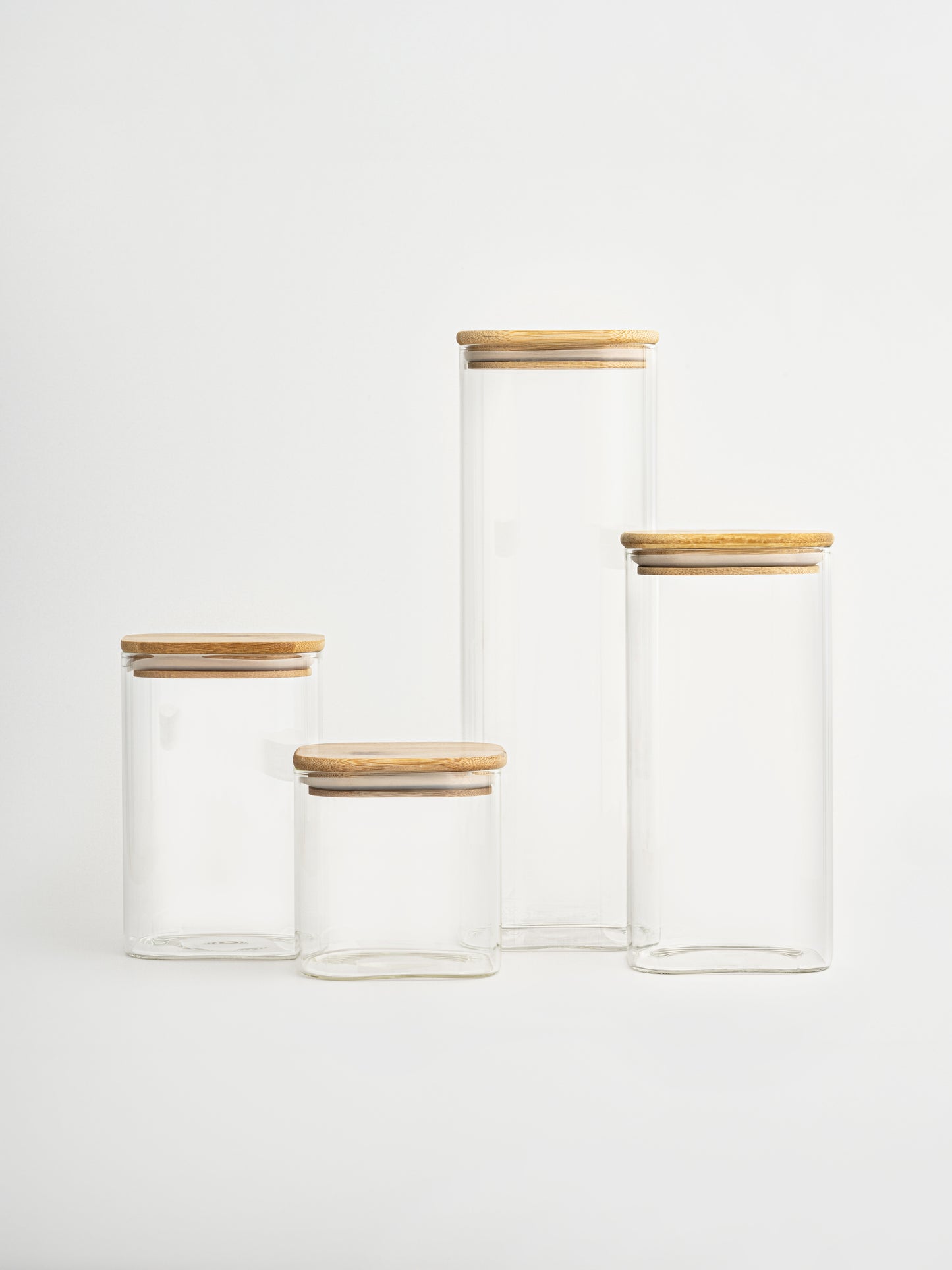 Square glass pantry jar with airtight bamboo lid, available in 4 sizes. Ideal for storing flour, rice, pasta and dry goods. Stylish and sustainable kitchen storage jar with a natural look. Clear glass container with bamboo lid, perfect for pantry organization. Matches IKEA-style, Amazon home, and minimalist kitchens. Airtight and stackable jar set for organized shelves. Eco-friendly kitchen organizer, perfect for modern pantries.