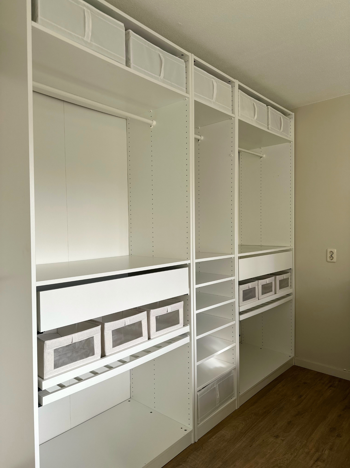 clothing bin, clothing container, clothing storage box, storing clothes, transparent clothing bin, stackable clothing bin, plastic clothing bin, drawer organizer for clothes, foldable clothing container, minimalist storage box, wardrobe storage system, neatly store clothes, clothing storage box, clear wardrobe overview, space-saving clothing bin, clothing storage solution