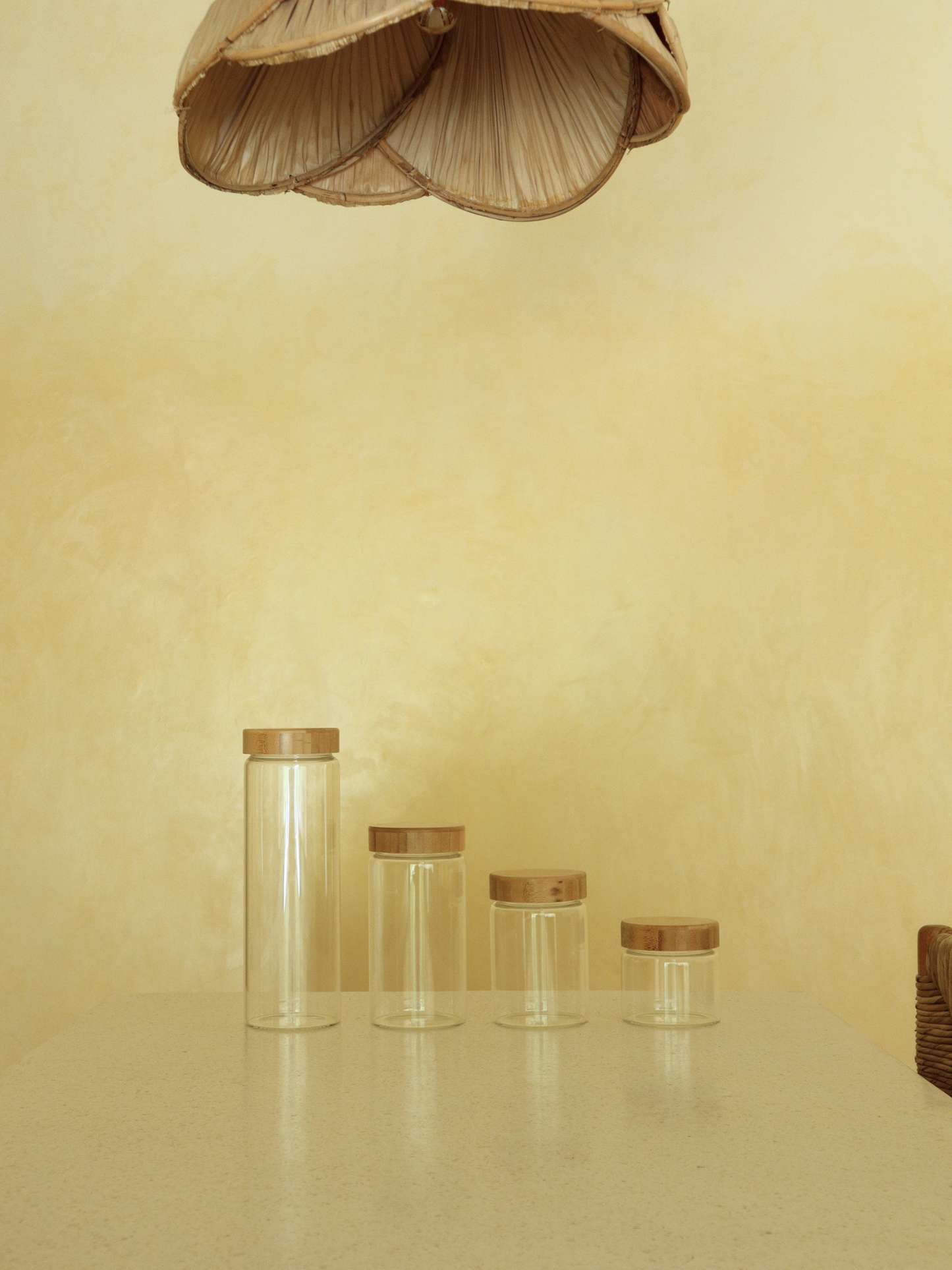 Extra stability and functionality with the Nani storage jar. An elegant, extra-durable glass container with a bamboo screw-top lid that effortlessly combines luxury and practicality. Its timeless, minimalist design complements any kitchen style. Made from extra-thick transparent glass and finished with a 100% airtight bamboo screw lid. Perfect for storing pasta, rice, coffee, and other dry foods while keeping them fresh for longer.