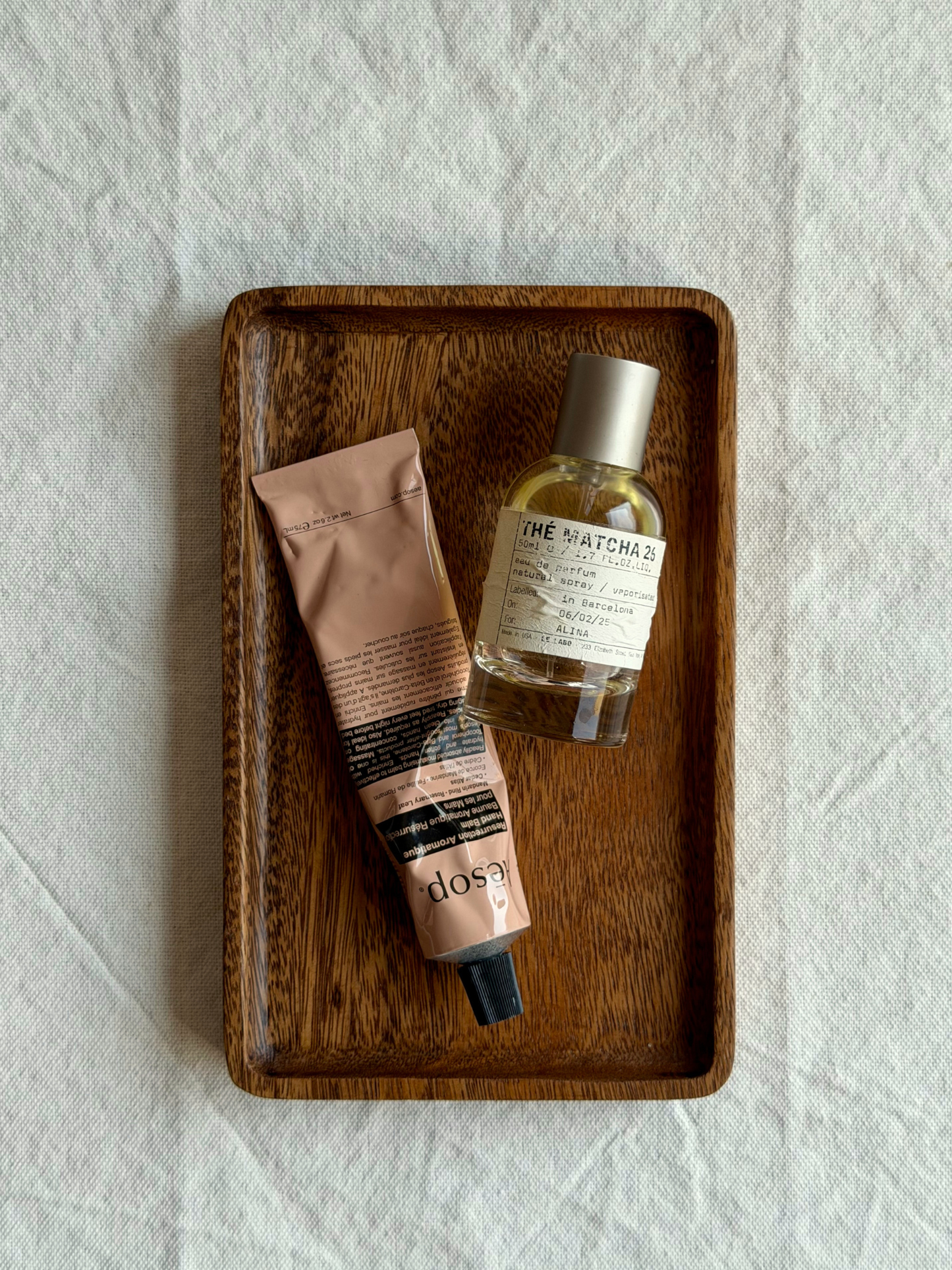 Dark brown rectangular wooden organizer tray Amara, available in two sizes, perfect for organizing spice jars, dispensers, soap and other small essentials. This versatile wooden tray can also be used as a coaster for kitchen accessories, a small bread board or a stylish base for items in the kitchen, bathroom or on the dining table. The warm natural wood grain adds a timeless, elegant touch and fits beautifully into a calm, minimalist interior. A practical and stylish wooden organizer.