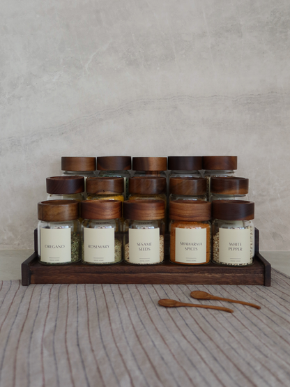 Dark brown wooden spice rack Calum for organizing up to 15 Osoe Home spice jars in a stylish and organized way, designed as a functional kitchen organizer for countertops or cabinets, made from sturdy dark wood with a minimalist and timeless design that creates a calm and elegant kitchen aesthetic, perfect for modern spice storage, pantry organization and creating a PFAS-free, BPA-free and microplastic-free kitchen environment with clutter-free kitchen styling.