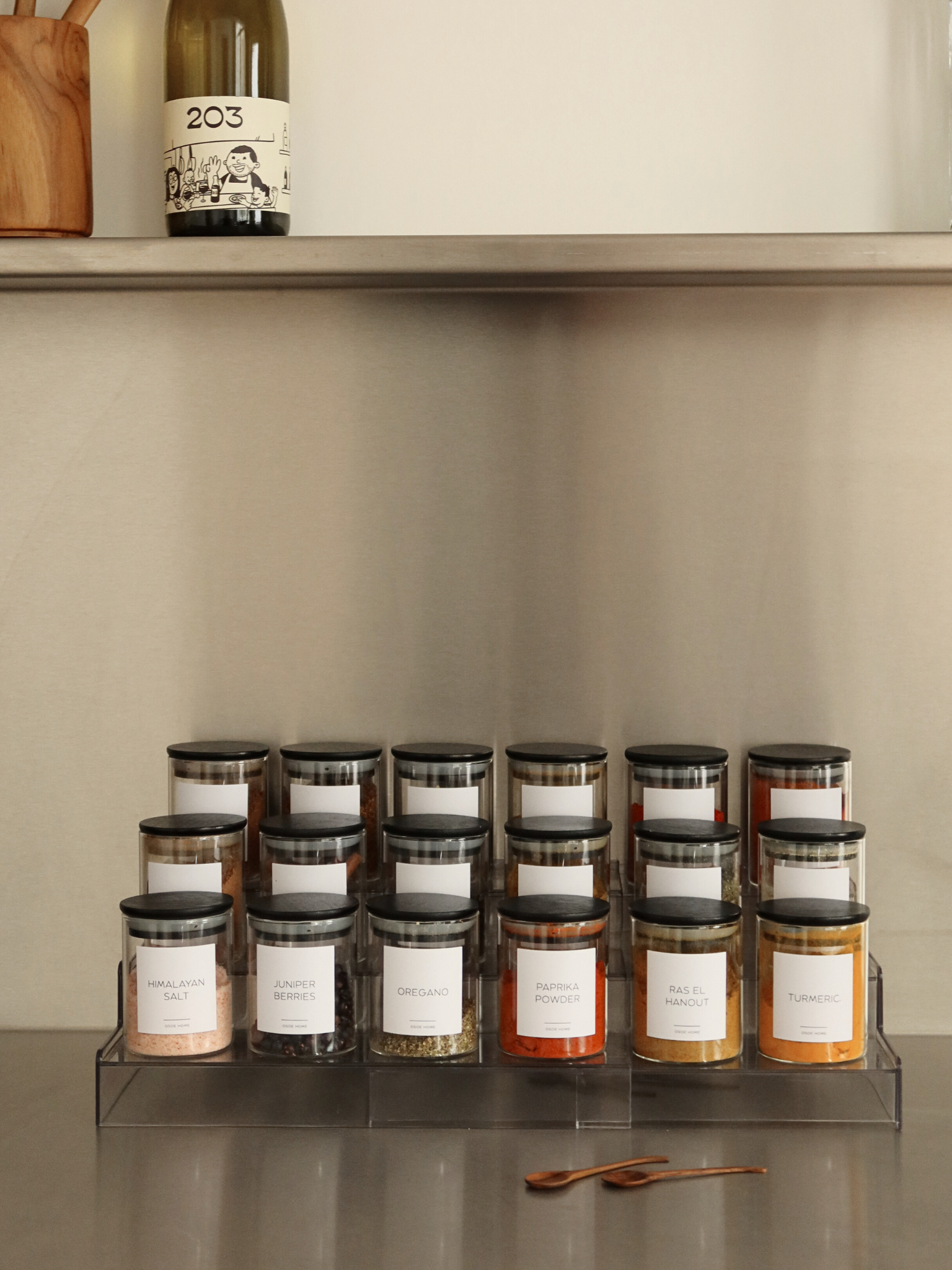 Extendable, collapsible spice rack made from clear, see-through acrylic, designed to neatly store spice jars in a kitchen drawer. This transparent acrylic spice rack creates a clean, minimal, and organized kitchen by keeping spice jars visible and easy to access. A space-saving spice organizer and drawer organizer that adjusts to different drawer sizes, helping maintain a structured and clutter-free kitchen layout. Ideal for organizing spice jars in a sleek, modern way while supporting efficient kitchen.