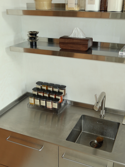 Extendable spice rack made from clear acrylic, designed to keep spice jars neatly organised in a kitchen drawer. This transparent storage system creates a clean, minimalist and organised look, while keeping every spice jar clearly visible and easy to reach. A space-saving spice organiser and drawer organiser that can be adjusted to fit different drawer sizes and helps create a well-organised kitchen. Ideal for keeping spice jars neatly stored and easily accessible.
