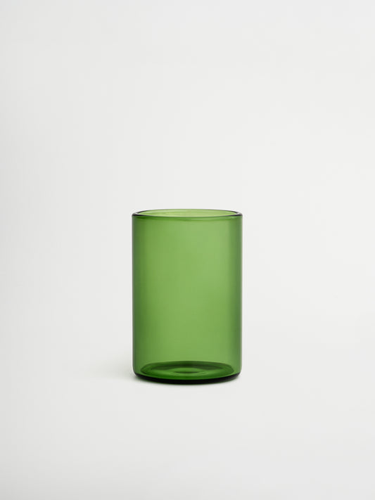 Give your table a trendy upgrade with Glass Naoki, featuring a taller design and deep green color that adds a subtle, restaurant-style touch. Perfect for water, soft drinks, or chilled beverages during dinner. Made entirely from green borosilicate glass, combining timeless elegance with practical durability. Heat-resistant and strong enough for daily use, yet refined enough to enhance any table setting. Sold individually, allowing you to choose exactly how many glasses complete your collection.