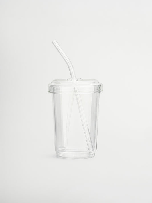 Reusable borosilicate glass cup with matching lid and straw, perfect for enjoying hot or cold drinks like iced coffee, tea, or matcha. This aesthetic glass tumbler combines style and sustainability, made from premium borosilicate glass that’s both lightweight and durable. Ideal for a minimalist home or office setup, it enhances your daily routine while reducing plastic waste. A must-have for aesthetic drinkware lovers who value clean design and eco-conscious living.

