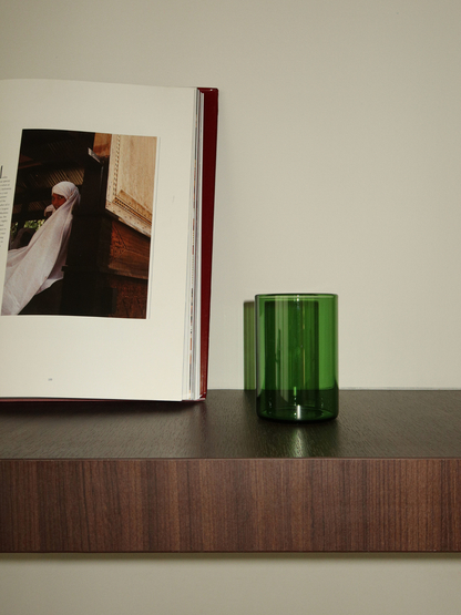 Elevate your table with Glass Naoki, featuring a taller, slender silhouette and a deep green hue that adds a subtle, restaurant-inspired touch. Perfect for serving water, soft drinks, or chilled beverages at dinner. Crafted entirely from green borosilicate glass, it combines timeless elegance with lasting durability. Heat-resistant and strong enough for everyday use, yet refined enough to enhance any table arrangement. Sold individually, allowing you to select exactly the number you need for your ideal sett