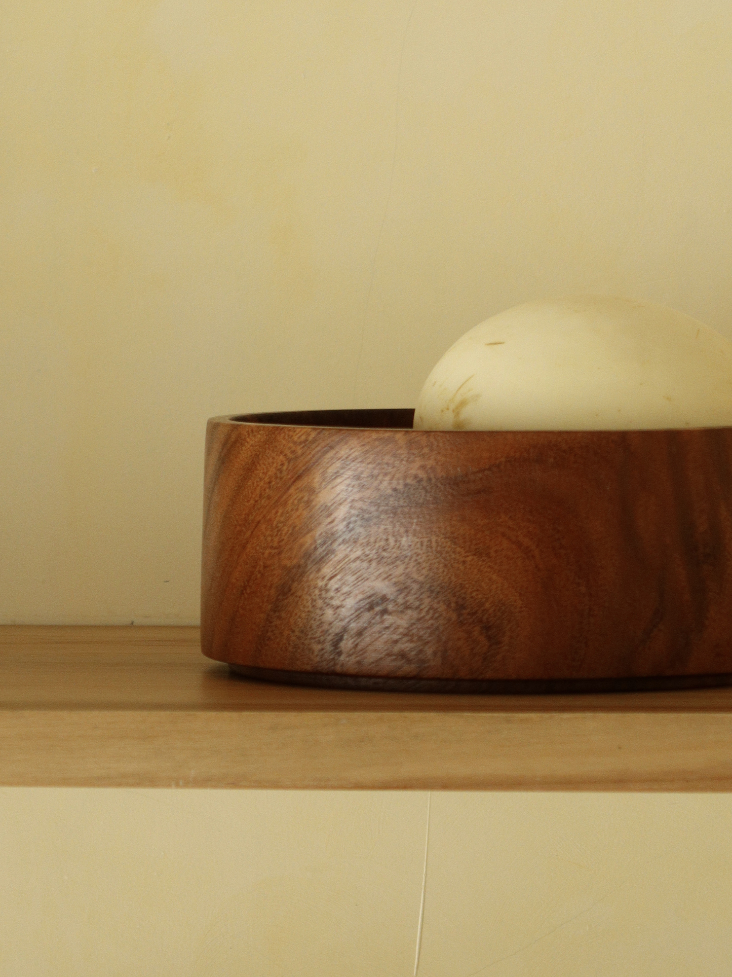 Handcrafted brown wooden fruit bowl for elegant storage and serving of fruit, snacks, sweets or salads in the kitchen or dining room, made from high-quality durable wood with a rich deep finish that highlights the natural wood grain, designed as a spacious and functional centerpiece for modern and classic interiors, with a smooth polished surface for easy cleaning and long-lasting use, perfect for stylish home organization and table presentation.