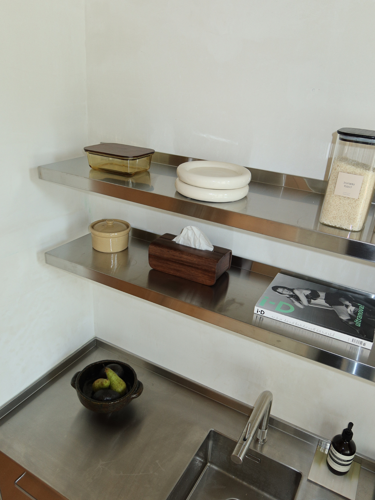 Tian handmade wooden tissue box holder, crafted from durable natural Borneo wood in a deep dark brown tone. Its clean, minimalist design discreetly conceals standard tissue boxes while adding a warm, refined touch to the room. Perfect for bathrooms, bedrooms and living spaces, this sustainable wooden organizer combines everyday functionality with natural materials and timeless design. A beautiful home accessory and thoughtful gift for lovers of minimalist interiors.