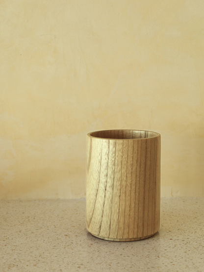 Kitchen utensil holder made from high-quality Asian Oak wood for stylish and organised storage of spoons, spatulas and tongs. This handcrafted wooden holder combines functionality with a warm, natural appearance and its timeless design complements a variety of kitchen styles. Made from durable wood with a sturdy construction designed for everyday use. A practical kitchen organiser that keeps cooking utensils neatly stored, easily accessible and organised for a calm and considered kitchen.
