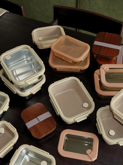 Store in style with Tamar, crafted from amber glass and finished with a wooden lid. Functional yet elegant, it’s ideal for mindful storage, reheating, and organizing. Available in three sizes, with the smallest perfect for yogurt, nuts, or snacks. The glass bowl (without lid) is oven-safe, allowing you to heat meals directly. A matching elastic band keeps the lid securely in place.
Tamar is toxin-free, PFAS-free, BPA-free, and microplastic-free — designed for safe, conscious, and durable everyday use.