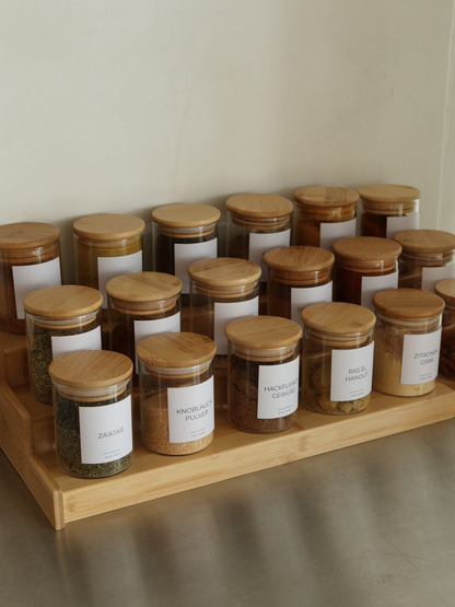 Glass spice jar with an airtight bamboo lid for keeping herbs and spices fresh and organised. Its simple, natural design fits beautifully into a modern kitchen while providing a practical solution for organised spice storage. The airtight lid helps protect spices from moisture and preserve their natural aromas. Ideal for a spice drawer, kitchen cupboard or spice rack, keeping every jar neatly organised and easily accessible. A timeless storage solution for a considered and organised kitchen.
