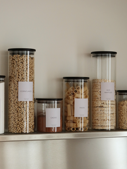 Round glass pantry storage jar with an airtight black bamboo lid, made from durable glass and available in four sizes. Designed for storing rice, pasta, grains, flour, and other dry ingredients in a neat and hygienic way. The black bamboo lid creates a secure airtight seal to help keep pantry staples fresh for longer. A stylish, sustainable, and easy-to-clean food storage solution for an organized kitchen or pantry.