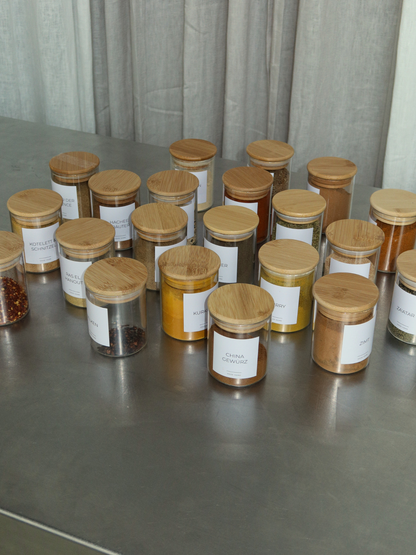 Glass spice jar with an airtight bamboo lid for keeping herbs and spices fresh and organised. Its simple, natural design fits beautifully into a modern kitchen while providing a practical solution for organised spice storage. The airtight lid helps protect spices from moisture and preserve their natural aromas. Ideal for a spice drawer, kitchen cupboard or spice rack, keeping every jar neatly organised and easily accessible. A timeless storage solution for a considered and organised kitchen.