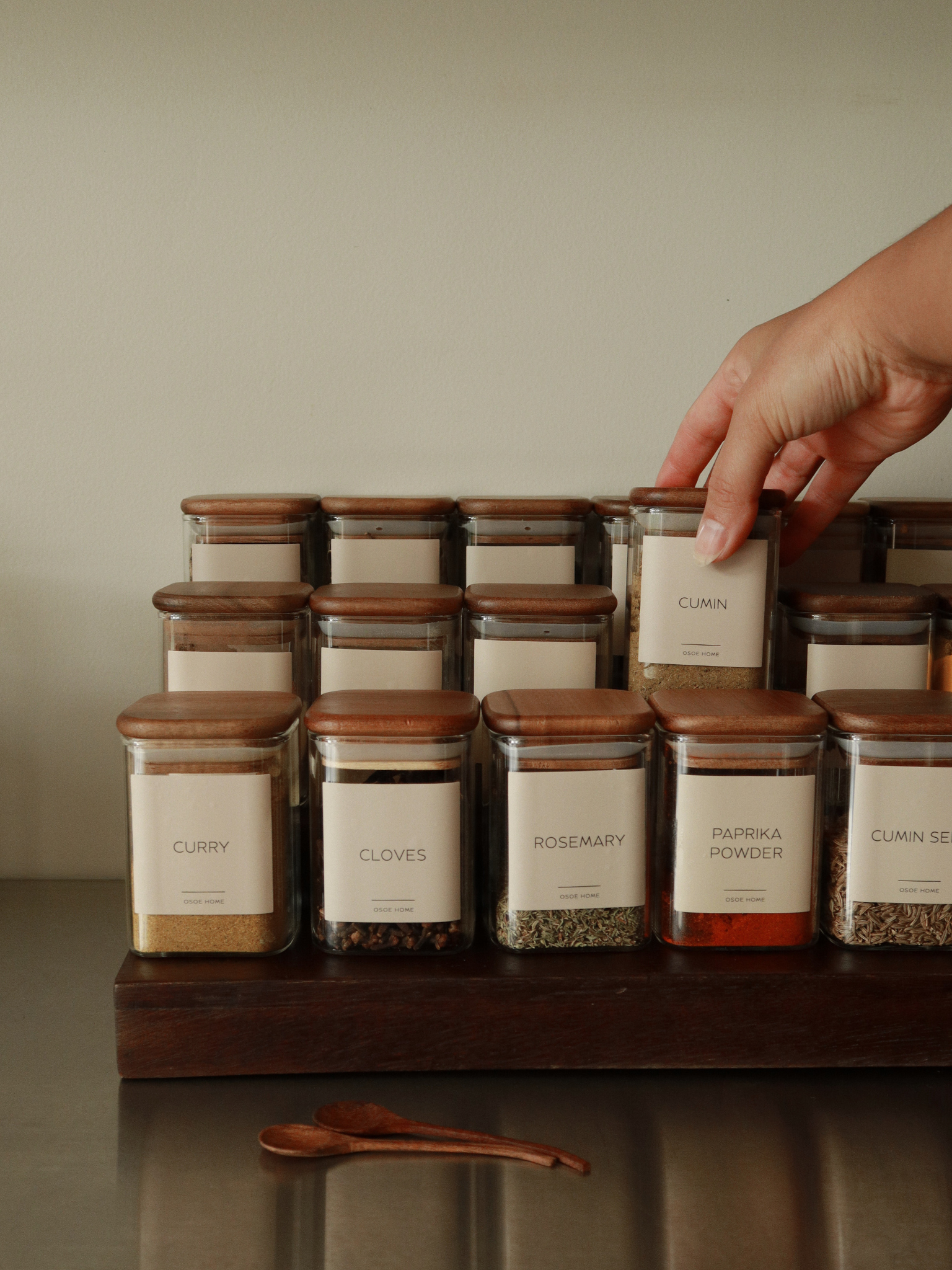 Bring calm and order to your kitchen with the Kai spice jar. Its smart square shape makes it easy to line up neatly in your cupboard or drawer, while giving you a clear overview of your herbs and spices at a glance. The clear glass jar is crafted from sturdy glass and finished with a square acacia wood lid featuring a tight rubber seal to keep contents fresh and aromatic for longer. A timeless and functional design that adds a natural, refined touch to any kitchen. Perfect to mix with other storage product.