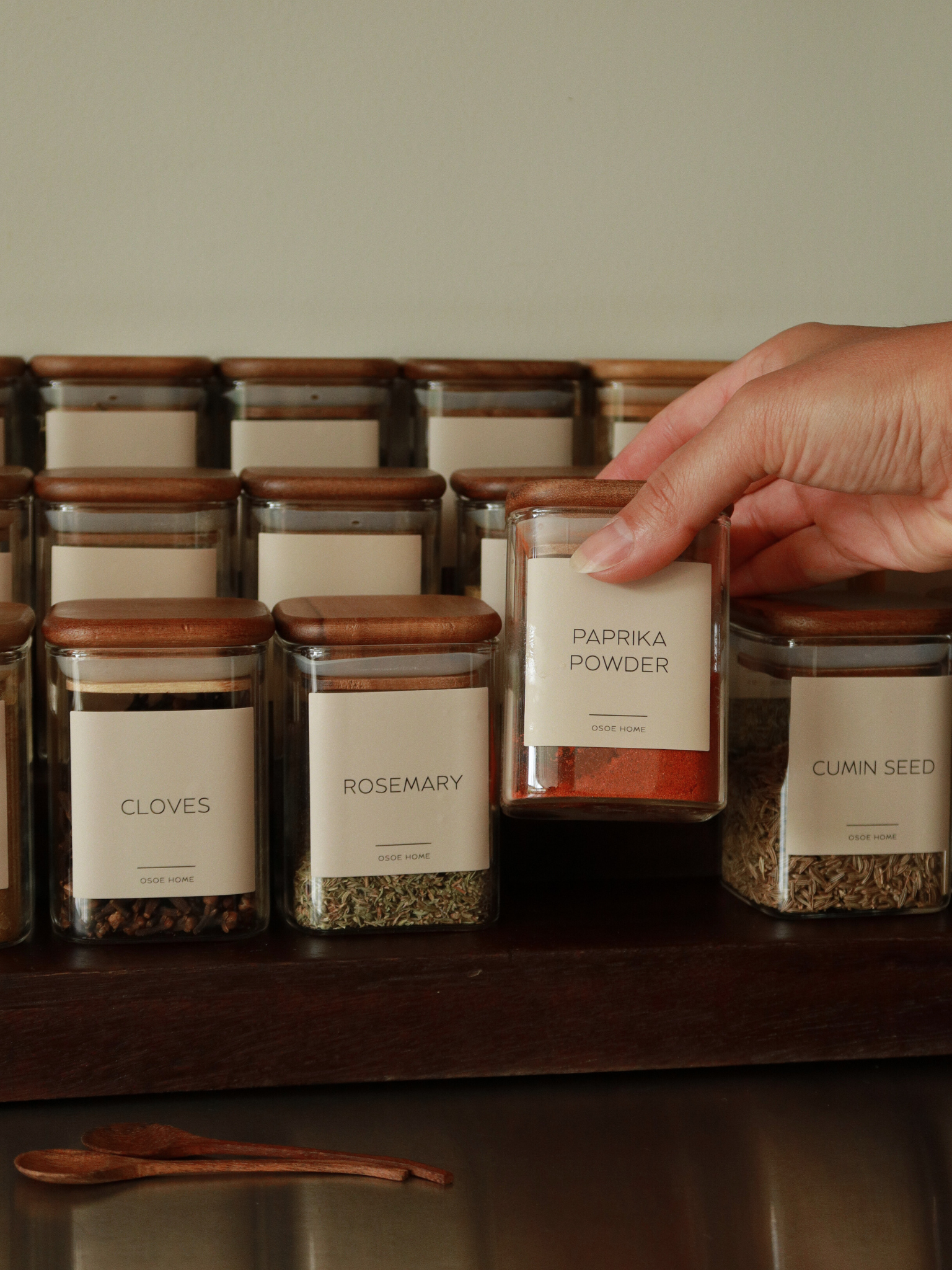 Bring calm and order to your kitchen with the Kai spice jar. Its smart square shape makes it easy to line up neatly in your cupboard or drawer, while giving you a clear overview of your herbs and spices at a glance. The clear glass jar is crafted from sturdy glass and finished with a square acacia wood lid featuring a tight rubber seal to keep contents fresh and aromatic for longer. A timeless and functional design that adds a natural, refined touch to any kitchen. Perfect to mix with other storage product.