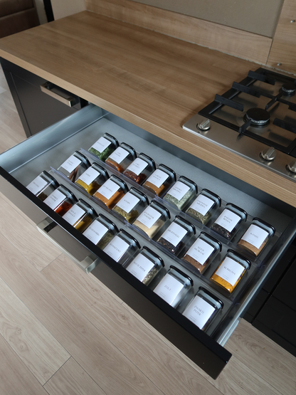 Transparent acrylic spice rack Ayla for organizing up to 15 Osoe Home spice jars in a clean and organized kitchen drawer, made from durable clear acrylic with a minimalist and space-saving design that perfectly fits modern kitchens, ideal for organized spice storage, drawer organization and creating a calm clutter-free kitchen aesthetic with easy access to herbs and spices while cooking, while also adding a luxurious and perfectly organized pantry look to your kitchen interior.