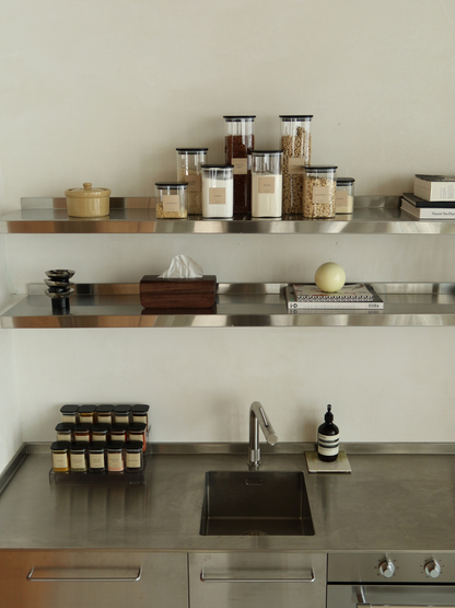 Extendable spice rack made from clear acrylic, designed to keep spice jars neatly organised in a kitchen drawer. This transparent storage system creates a clean, minimalist and organised look, while keeping every spice jar clearly visible and easy to reach. A space-saving spice organiser and drawer organiser that can be adjusted to fit different drawer sizes and helps create a well-organised kitchen. Ideal for keeping spice jars neatly stored and easily accessible.
