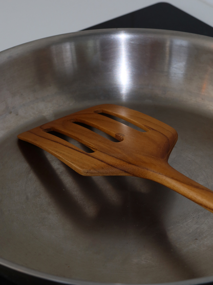 Handcrafted 6-piece teak wood kitchen utensil set made from natural, durable teak wood, featuring dark brown wooden utensils with a smooth luxury finish. This eco-friendly wooden kitchen utensil set includes essential handmade teak cooking tools designed for everyday use, offering strength, heat resistance, and long-lasting quality. Stylish and practical teak wood accessories that complement an organized kitchen, perfect for home organizing and pairing with a kitchen tool organizer. Handcrafted wood. 