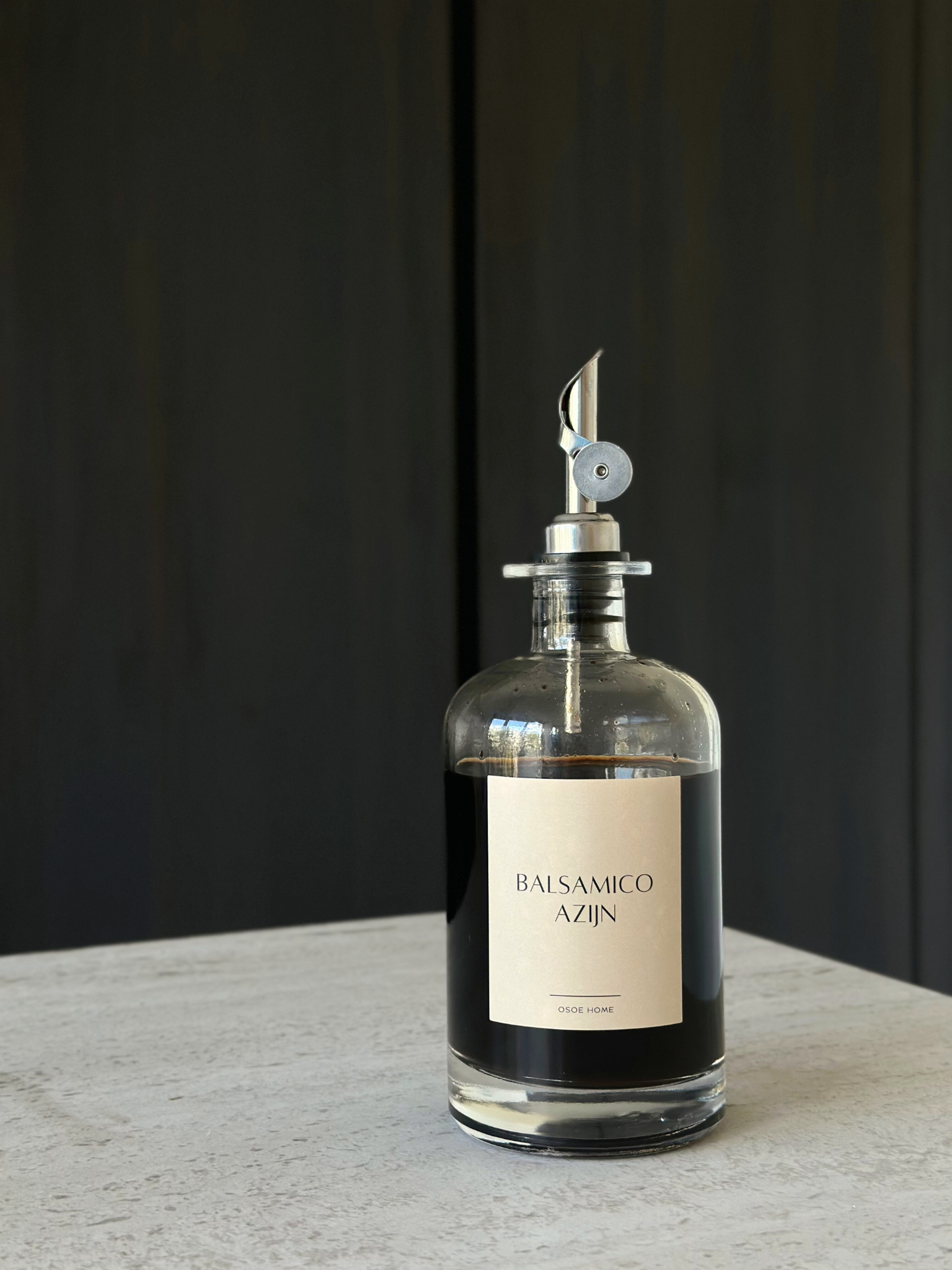 Set of two glass oil and vinegar dispensers with sleek silver caps and modern pour spouts, designed to elevate your kitchen organization. These clear, reusable bottles offer a stylish and functional way to store your favorite condiments while maintaining a clutter-free, minimalist countertop. The silver details add a refined, timeless touch that pairs beautifully with other organizing essentials from brands like Ikea, Hema, and Temu. Ideal for tidy pantries, curated kitchen zones, and sustainable home setup